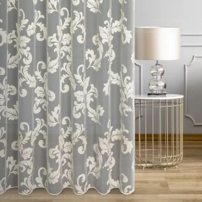 Firana szyta na taśmie 5 cm kremowa z ekskluzywnej tkaniny organtynowej z wzorem roślinnym, wykończona obciążnikiem