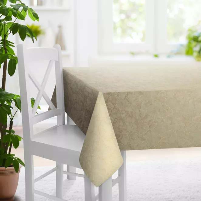 Obrus szyty kremowy z tkaniny z wzorem przetykanym błyszczącą nicią