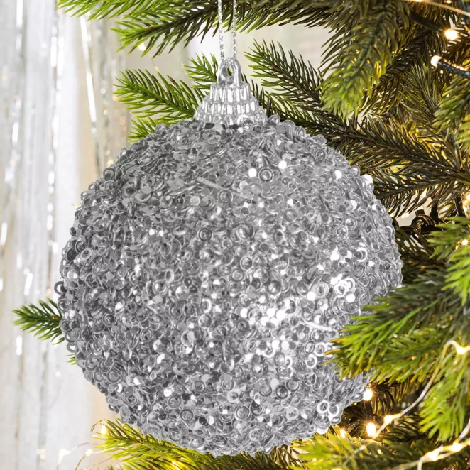 Bombka choinkowa dekorowana lśniącymi drobinkami