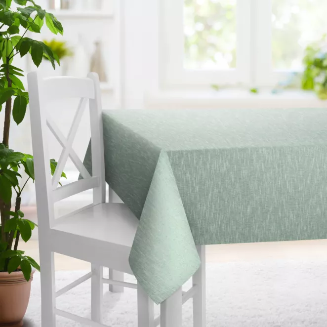 Obrus szyty miętowy z matowej luźnotkanej tkaniny z efektem melanżu, wykończona obciążnikiem