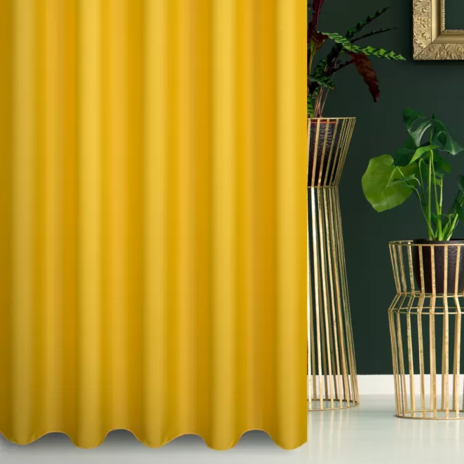 Zasłona szyta na taśmie 5 cm żółta z gładkiej tkaniny zaciemniającej typu dimout wykończona obciążnikiem