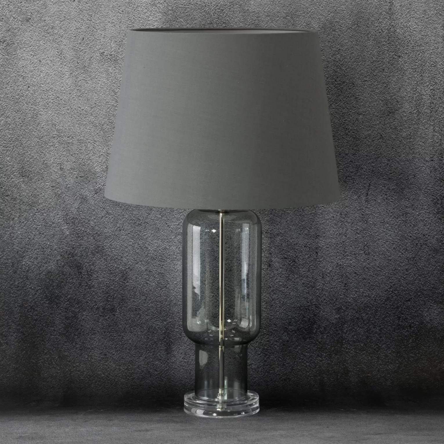 Lampa stołowa do kuchni popielata  podstawa z przezroczystego szkła z abażurem z matowej tkaniny 32 x 66 cm LILA