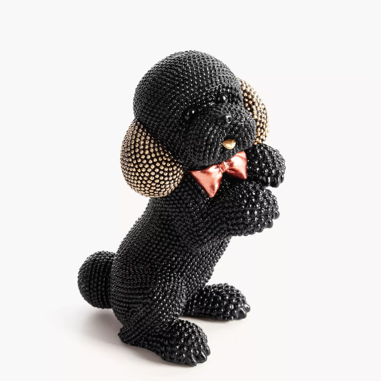Figurka czarno-złota pies  o drobnym strukturalnym wzorze 10x7x15 cm ELDO