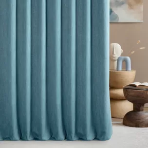 Zasłona szyta na flexach jasnoturkusowa z tkaniny o naturalnym splocie z efektem melanżu