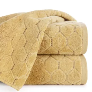 Ręcznik kąpielowy 70x140 cm bawełniany kolor musztardowy z welwetową geometryczną bordiurą 500 g/m2 LUMIA