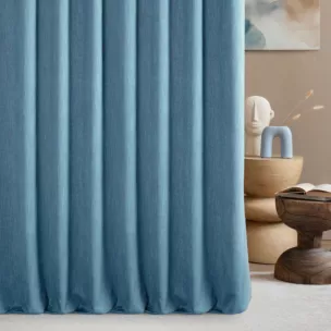 Zasłona szyta na flexach niebieska z tkaniny o naturalnym splocie z efektem melanżu