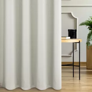 Zasłona szyta na taśmie 5 cm kremowo złota z gładkiej tkaniny przeplatanej błyszczącą lureksową nicią o wzorze w kropki