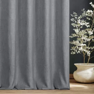 Zasłona szyta na przelotkach szara o naturalnym charakterze, z widocznym, ozdobnym splotem