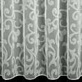 Tkanina firanowa lekka organdyna, z ornamentowym wzorem na całej powierzchni, wykończona obciążnikiem