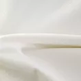 Zasłona szyta na taśmie 5 cm JULIETT kremowa z eleganckiej połyskującej tkaniny przetykanej lureksową nicią