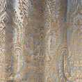 Roleta rzymska jasnoszaro złocista z grubej welwetowej tkaniny w elegancki połyskujący wzór