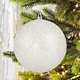 Bombka choinkowa obsypana lśniącym brokatem