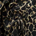 Poszewka szyta czarno złota z szenilowej tkaniny w zwierzęcy wzór przetykany błyszczącą nicią