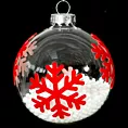 Bombka z transparentnego szkła z motywem czerwonych śnieżynek wypełniona sztucznym śniegiem