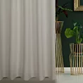 Zasłona szyta na flexach jasnobeżowa z gładkiej tkaniny zaciemniającej typu dimout wykończona obciążnikiem