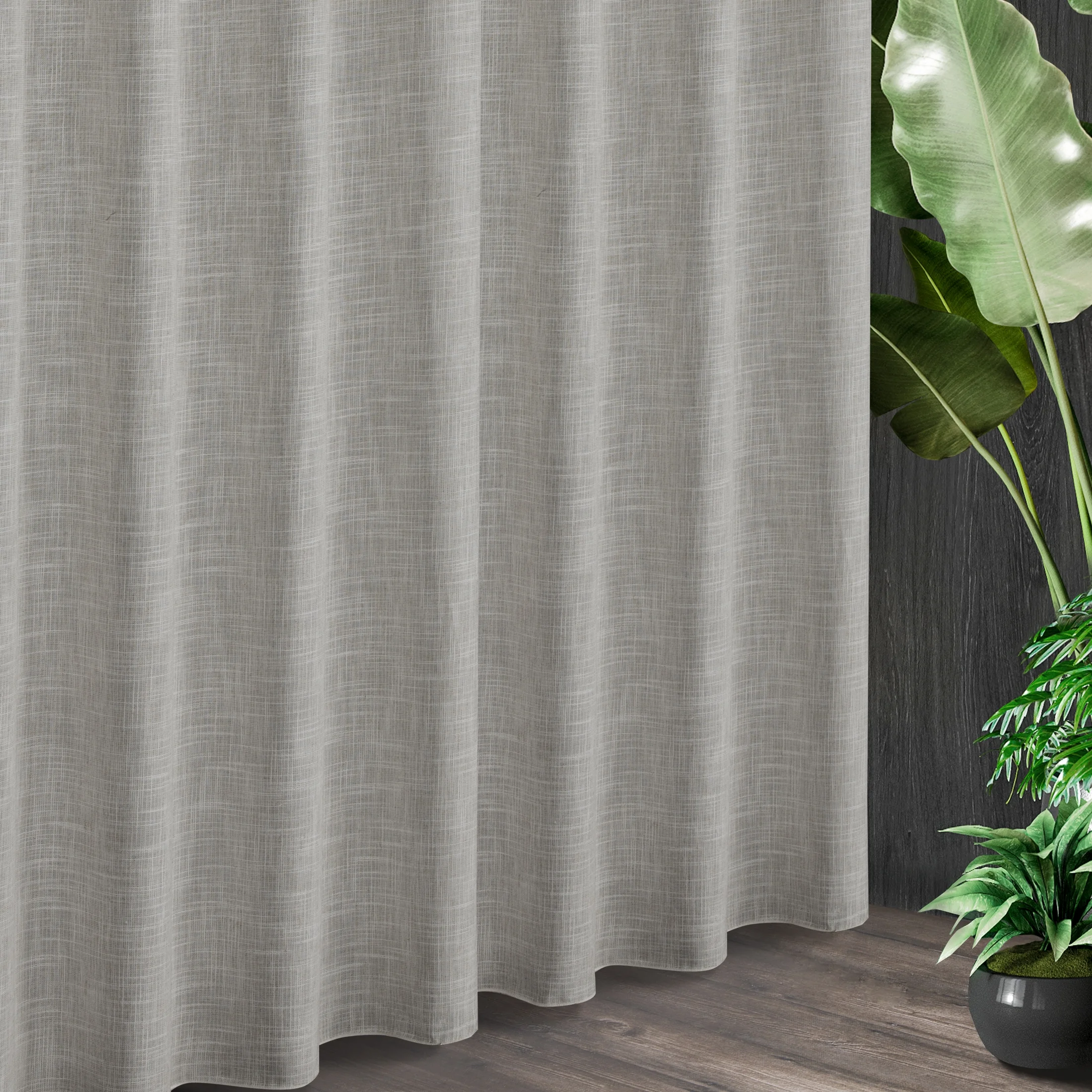 Tkanina zasłonowa z dodatkiem lnu o melanżowym wzorze zakończona obciążnikiem