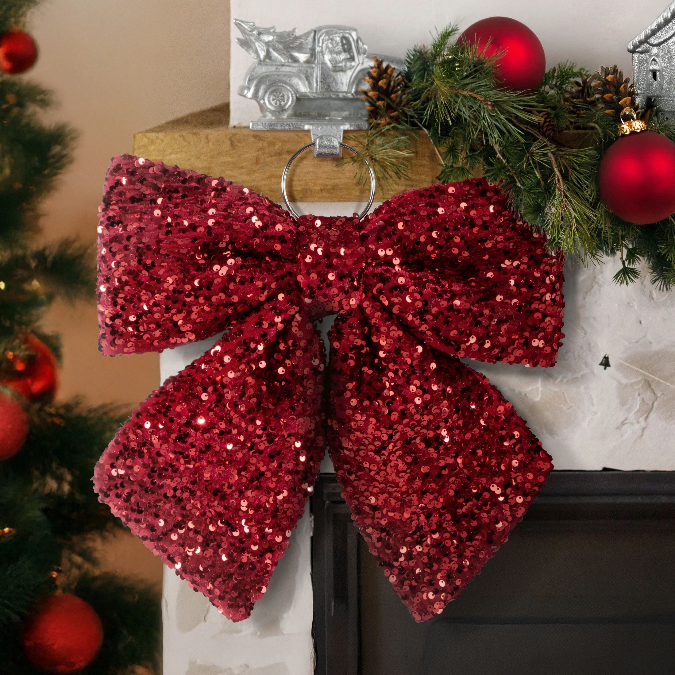 Świąteczna ozdoba w kształcie kokardy z błyszczącej tkaniny z lśniącymi cekinami | eurofirany