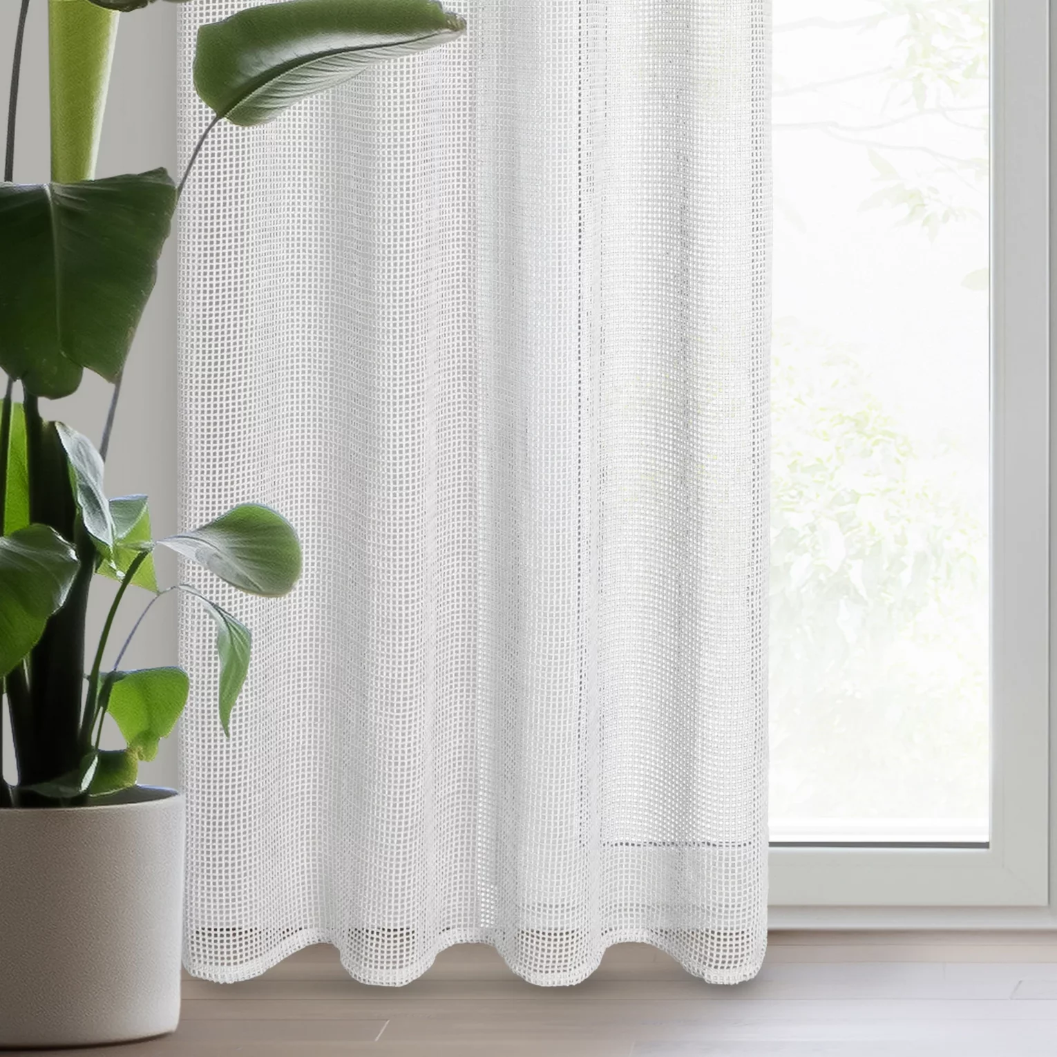 Firana biała z lekkiej mikrosiateczki z połyskiem zakończona koronką 140x250 cm przelotka NEL