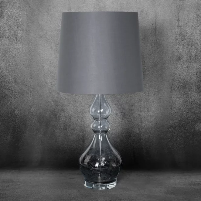 Lampa stołowa do pokoju stalowa na podstawie ze szkła z abażurem z matowej tkaniny 32 x 76 cm TIANA